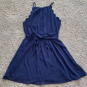 Navy blue dress, scalloped sleeves, high neck